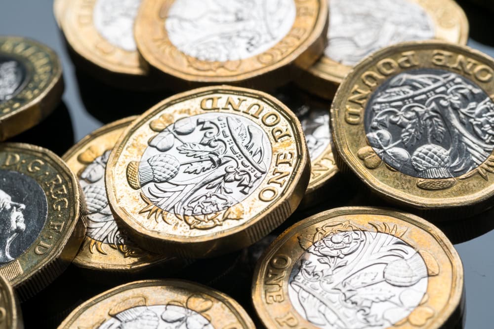 Pile of one pound coins