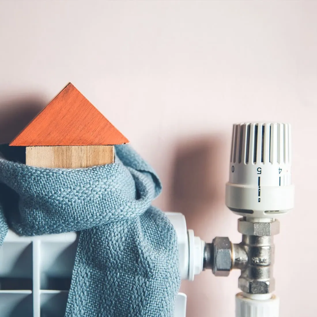 Central heating with scarf, wooden house on top